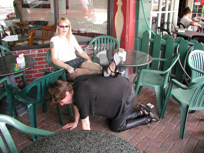 Foot stool for the Mistress at the cafe