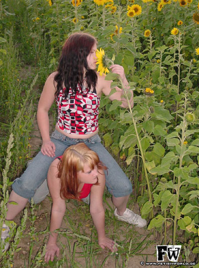 Riding her blonde slave girl around the flower farm