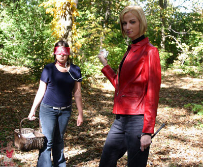 Goddess Giselle leads her leashed up slave girl for a picnic